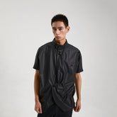 KADAKADA Asymmetrical Pleated Faux Leather Half Shirt