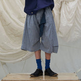 RELABEL Detachable Scarf Grid Pleated Shorts