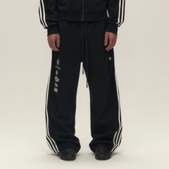 SAVAGEGROWTHWORLD Back-Arc Striped Graphic Track Pants