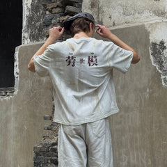LUUUCAM Brushstroke Distressed Graphic Boxy T-Shirt