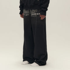 SAVAGEGROWTHWORLD Bullet Graphic Washed Wide-Leg Sweatpants