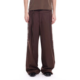 WHISTLEHUNTER Studded-Side Strap Straight-Leg Pants
