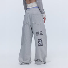 SAVAGEGROWTHWORLD Slogan Curved Drawstring Sweatpants