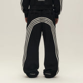 SAVAGEGROWTHWORLD Back-Arc Striped Graphic Track Pants