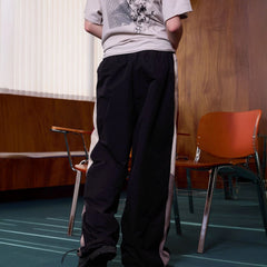 ERROR CODE ROBOT Diagonal Stripe Suede Track Pants