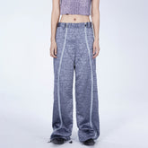 EMBRYO Deconstructed Front-Zipper Cracked Flared Pants