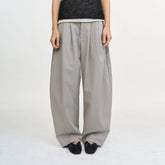 LEONSENSE Pleated Tencel Oversized Curved Pants