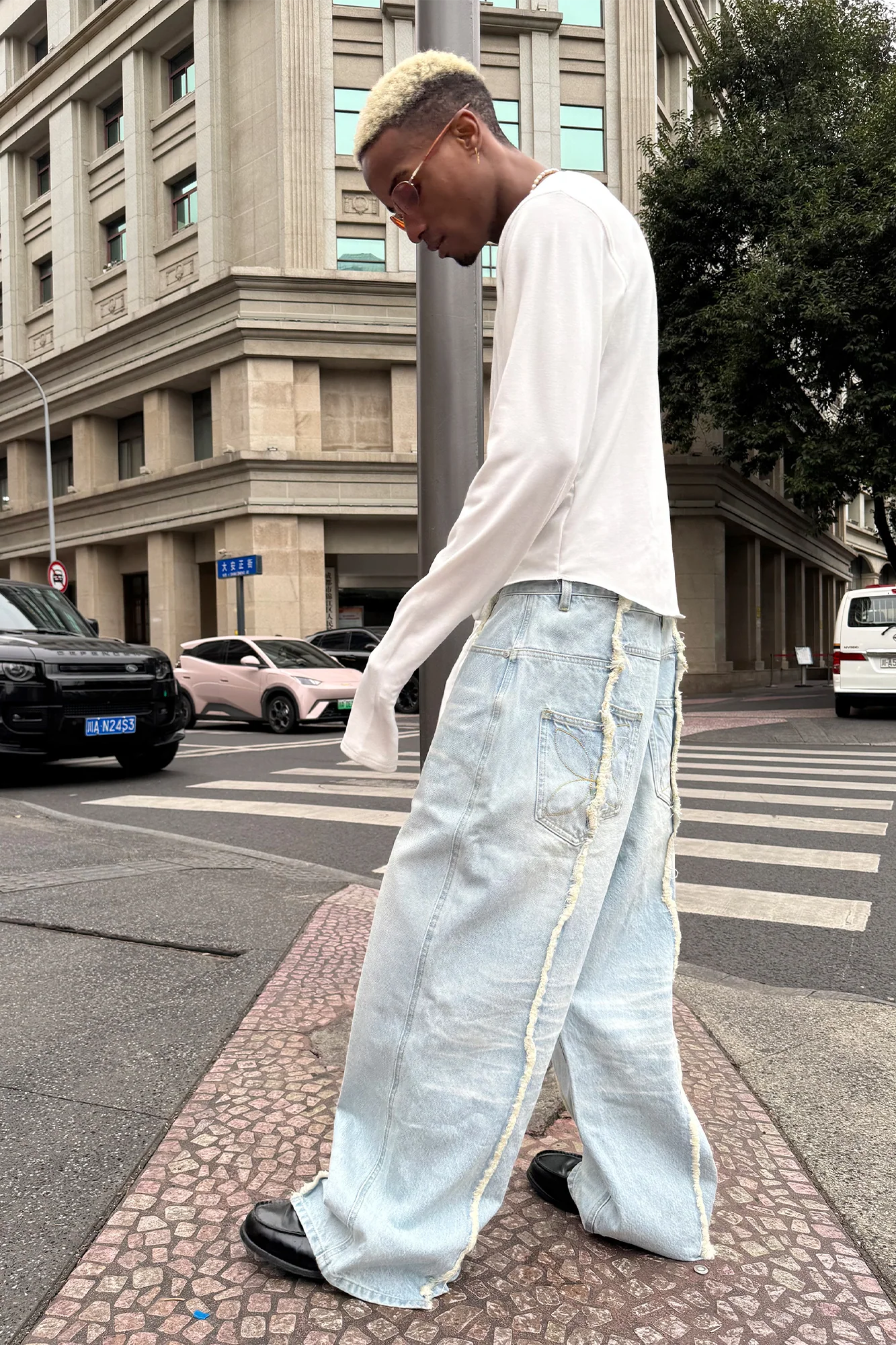 STEEPC Washed Frayed Seam Baggy Jeans