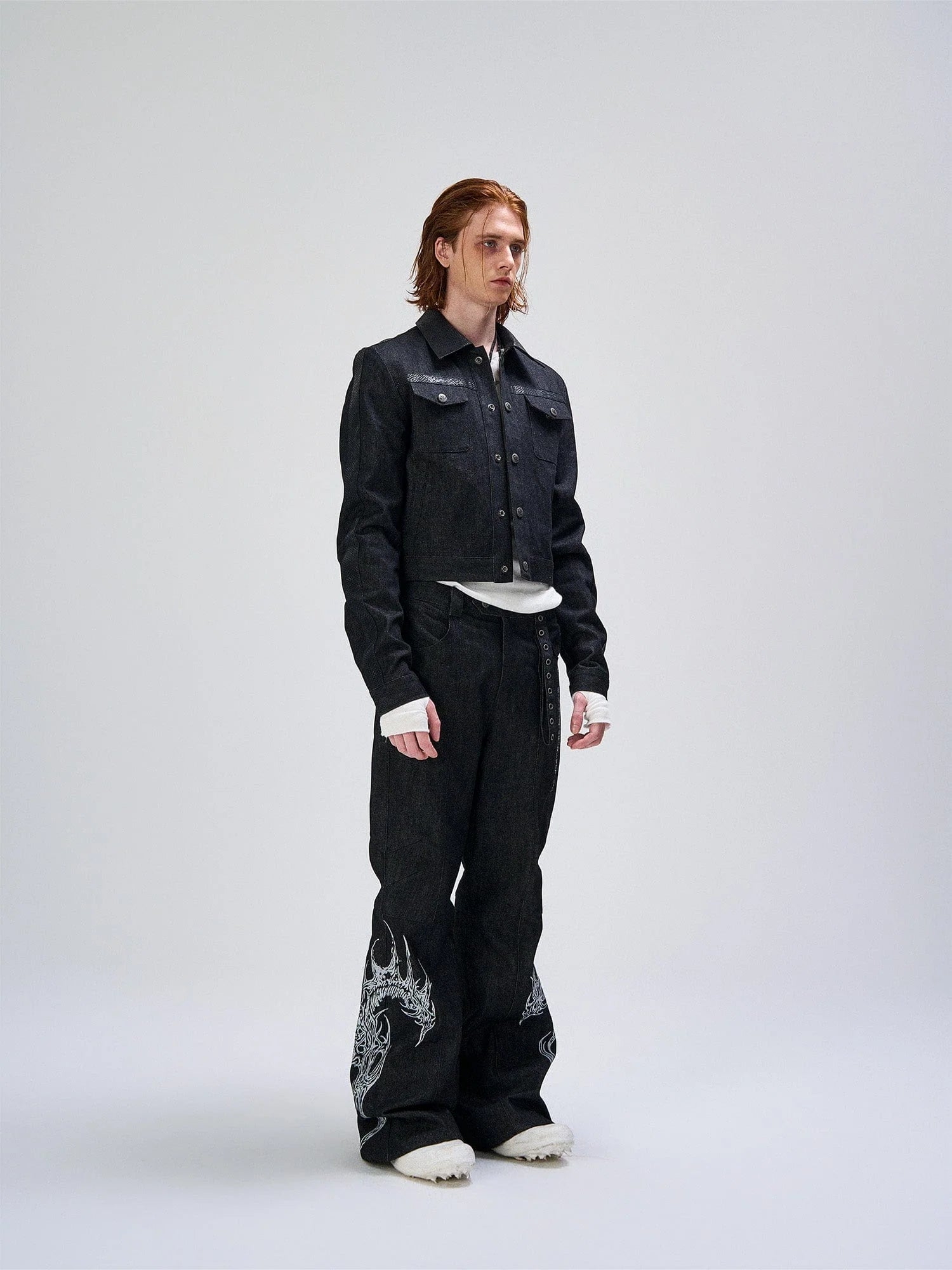 FLYERRER Abstract Graphic Flared Raw Jeans