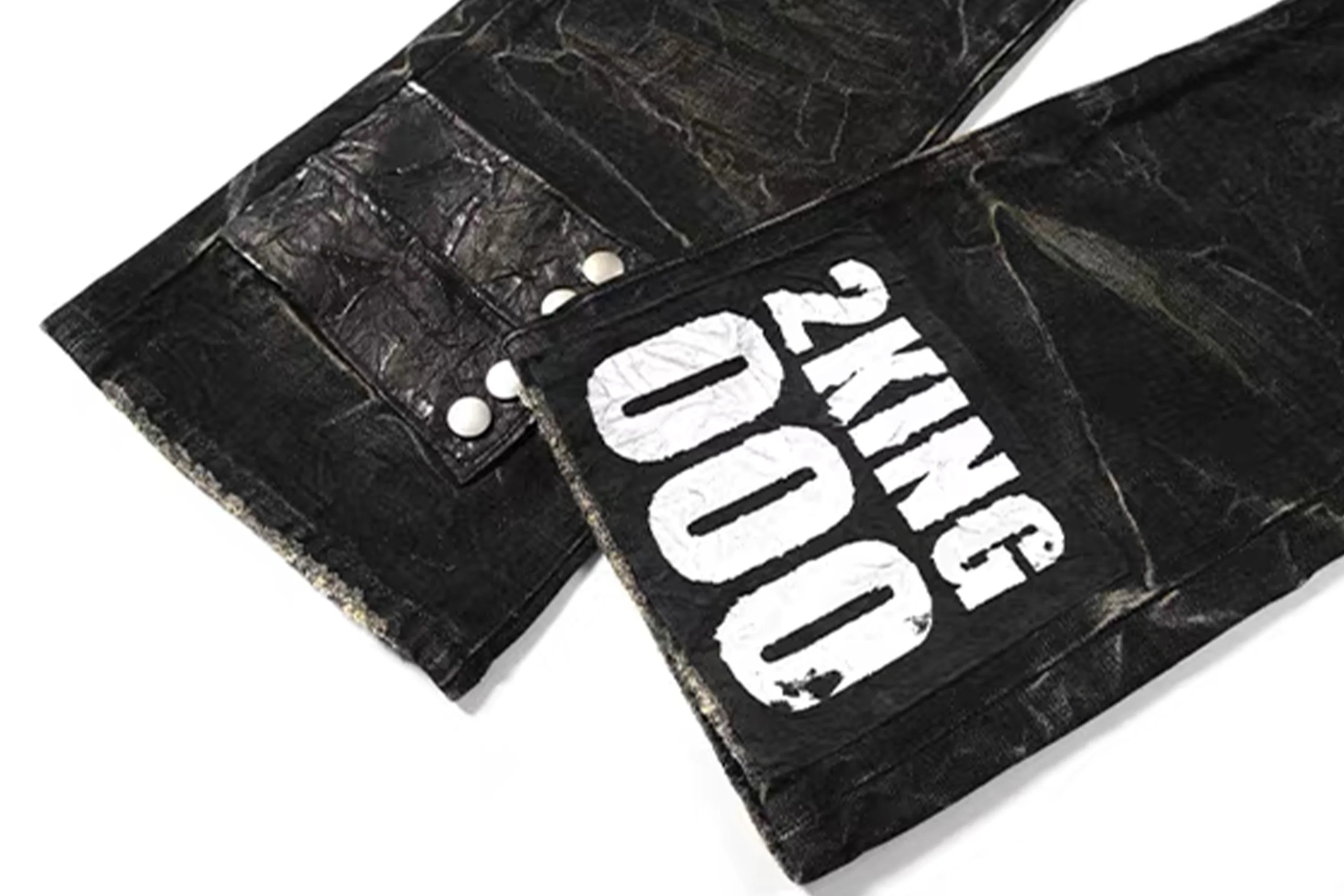 NOTHINGNESS WORLD Distressed Ripple-Wash Graphic Denim Pants