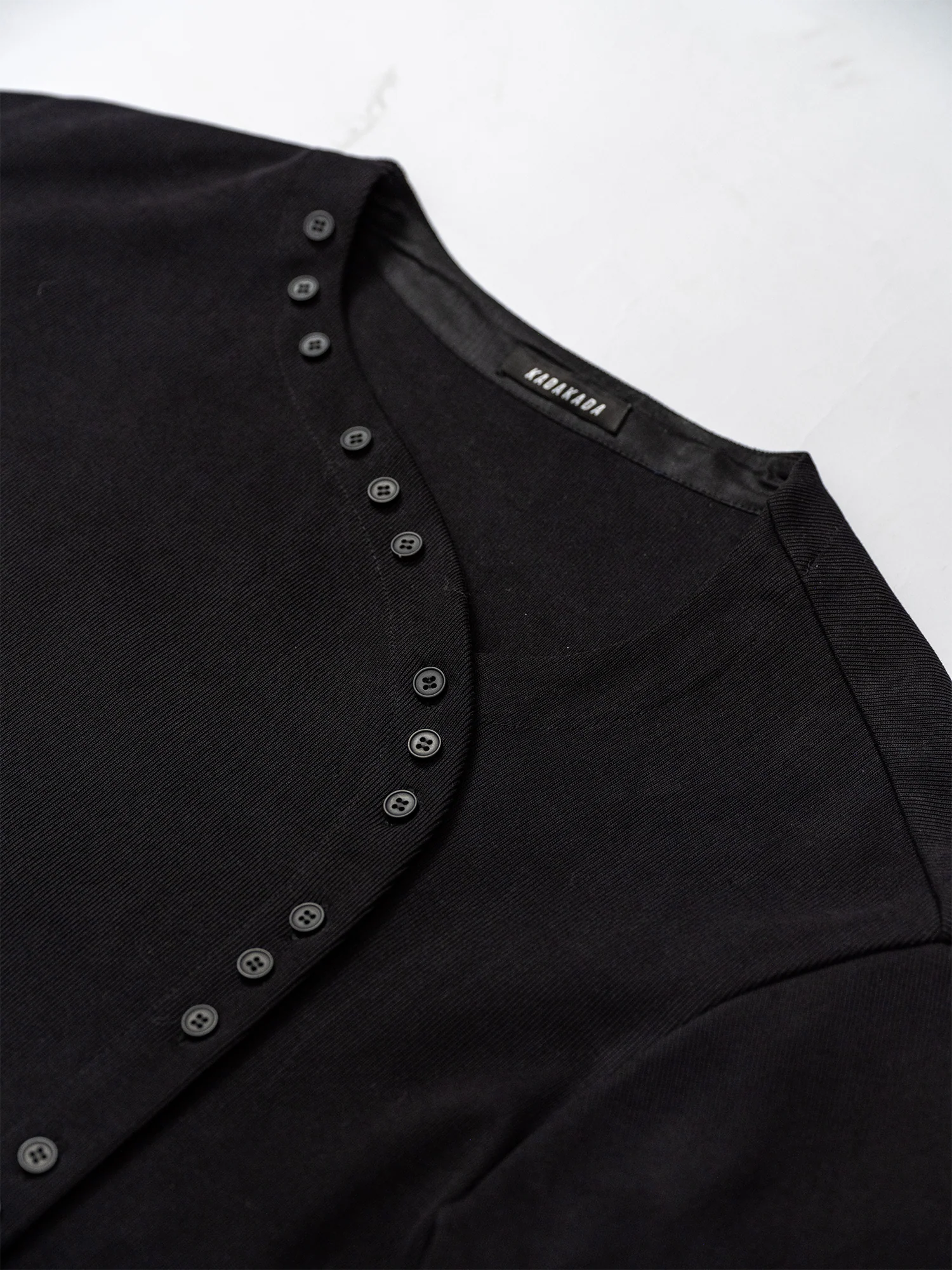 KADAKADA Buttoned Curved Placket Ribbed Knit Top