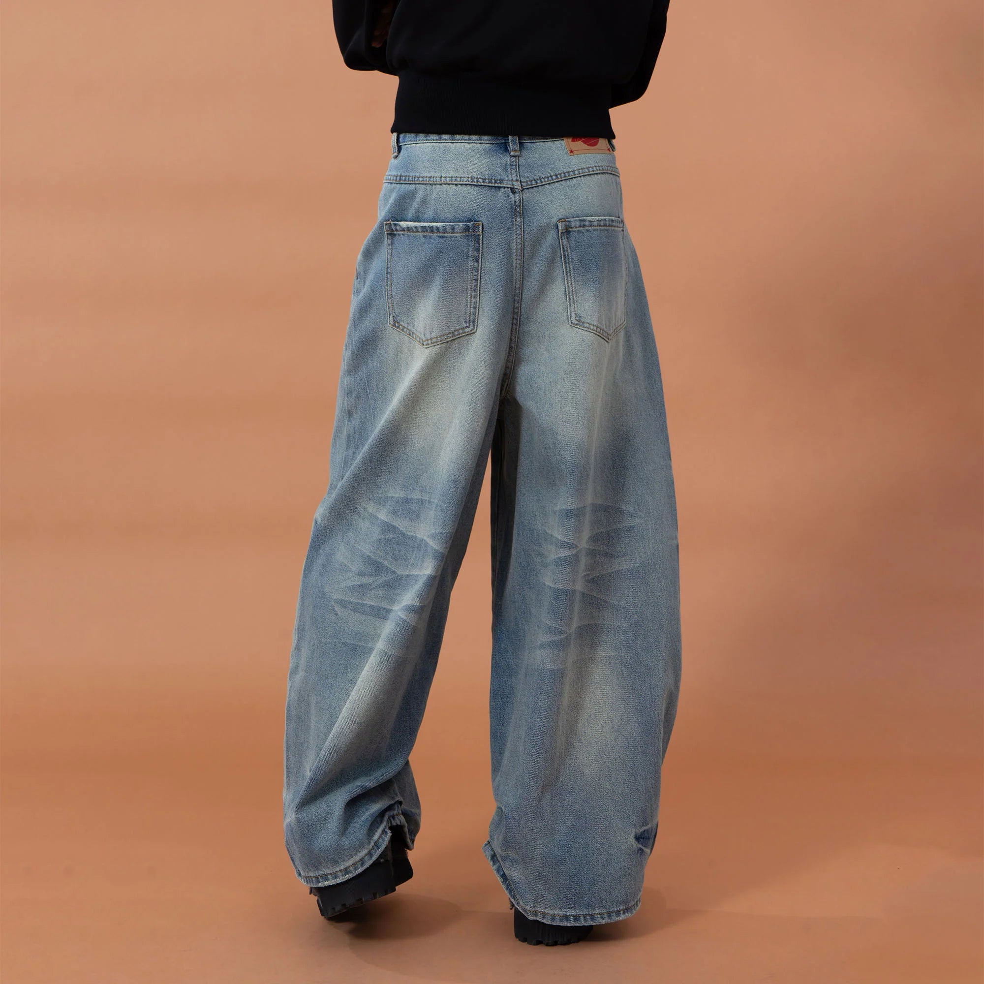 CLP Whiskering Washed Oversized Curved-Leg Jeans