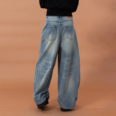 CLP Whiskering Washed Oversized Curved-Leg Jeans