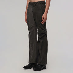 ILNya Nieternite Nifutur Contrast-Spliced Twist-Knee Flared Trousers