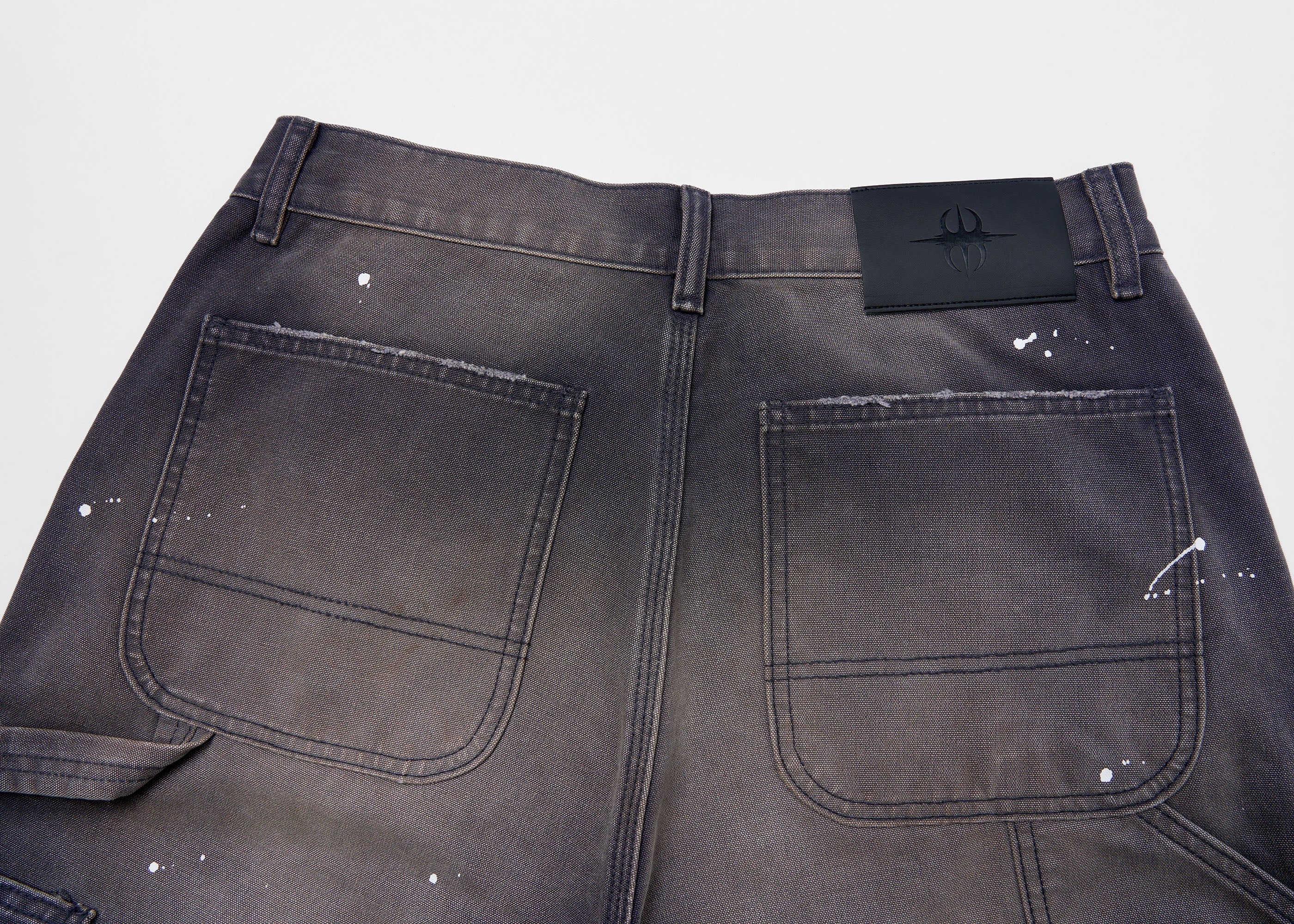 SAVAGEGROWTHWORLD Distressed Double-Knee Splatter Jeans