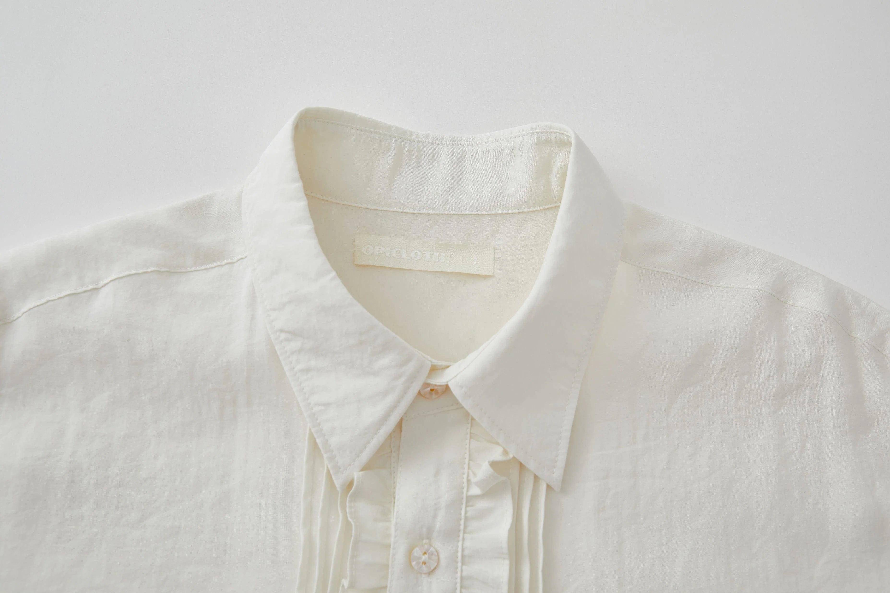 OPICLOTH Retro Pintuck Ruffle Modal Blend Half Shirt