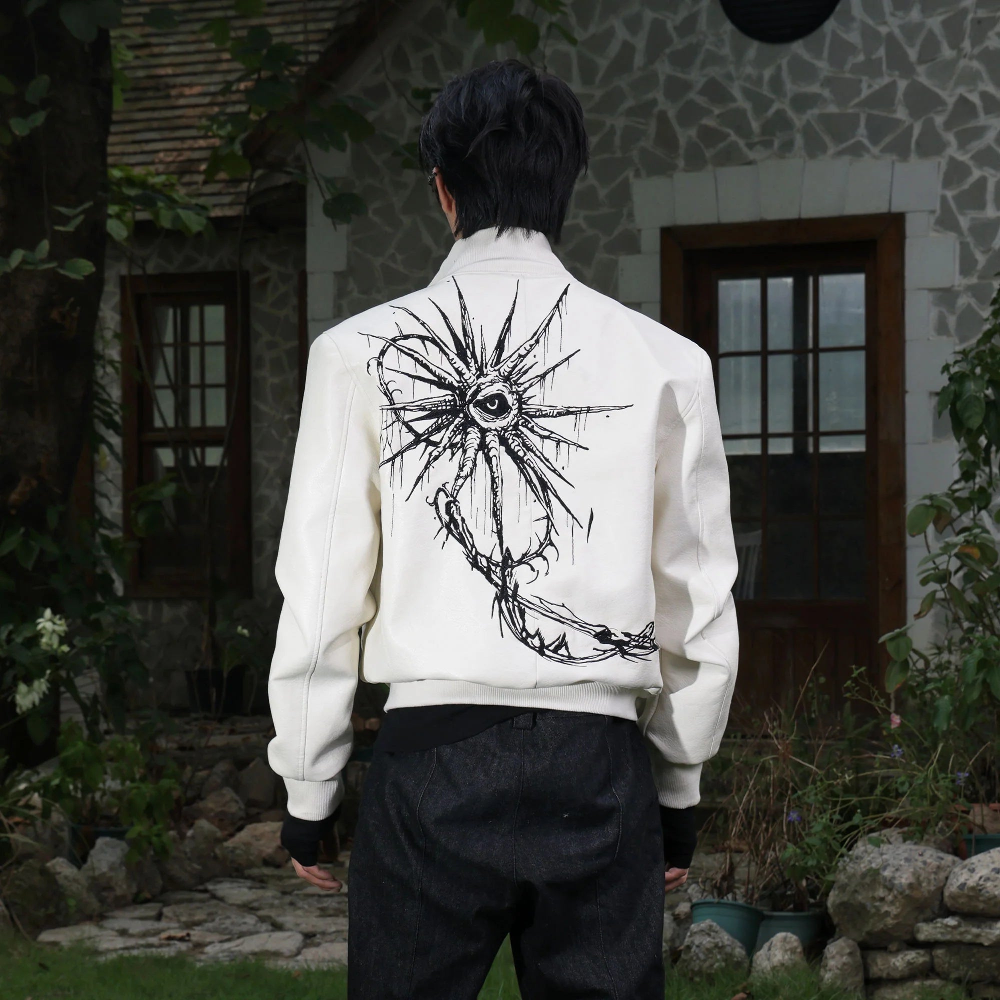 FLYERRER Thorned Eye Graphic Faux Leather Jacket