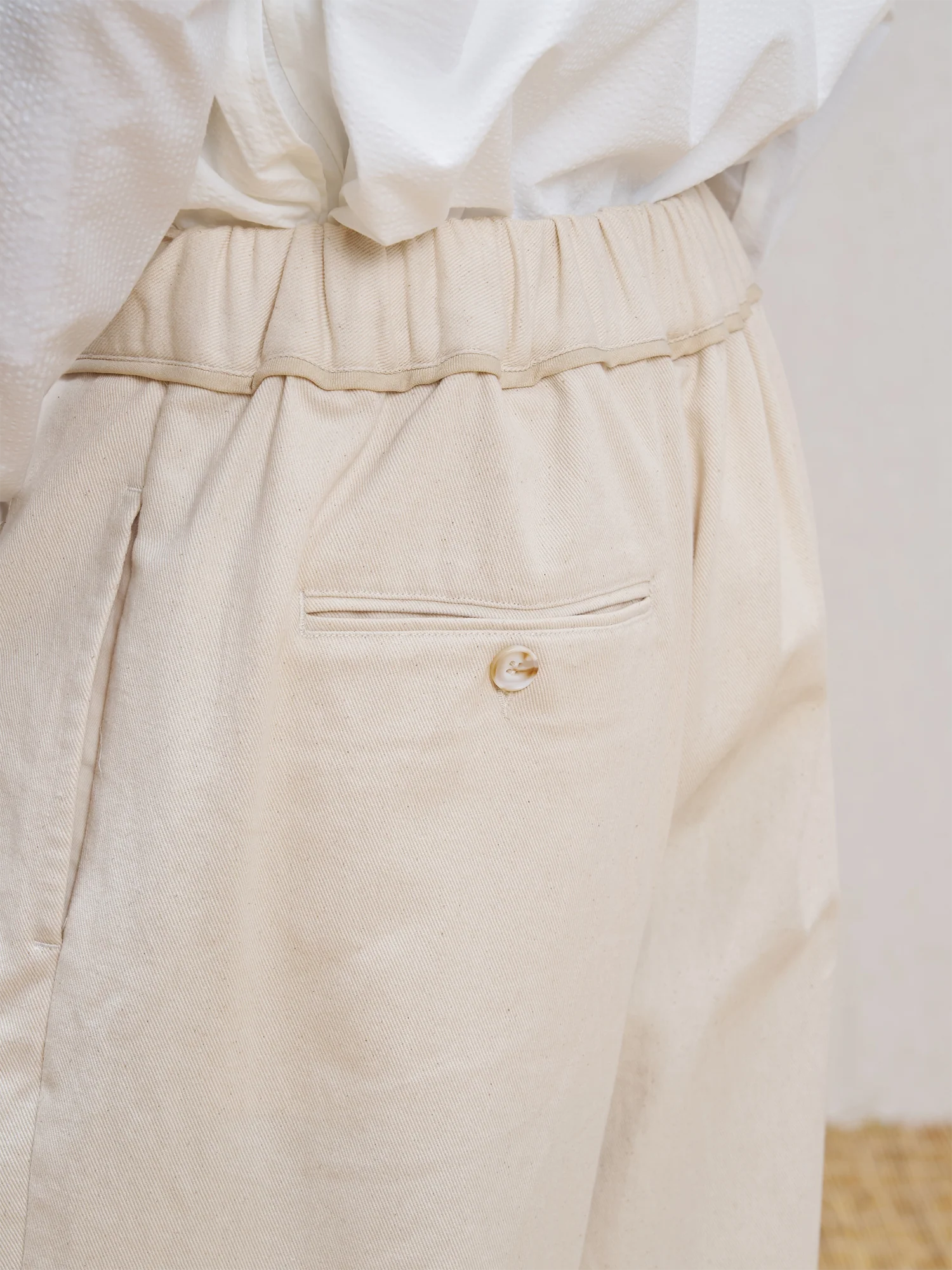 UNLIMITED MOTE Pleated Herringbone Wide-Leg Trousers