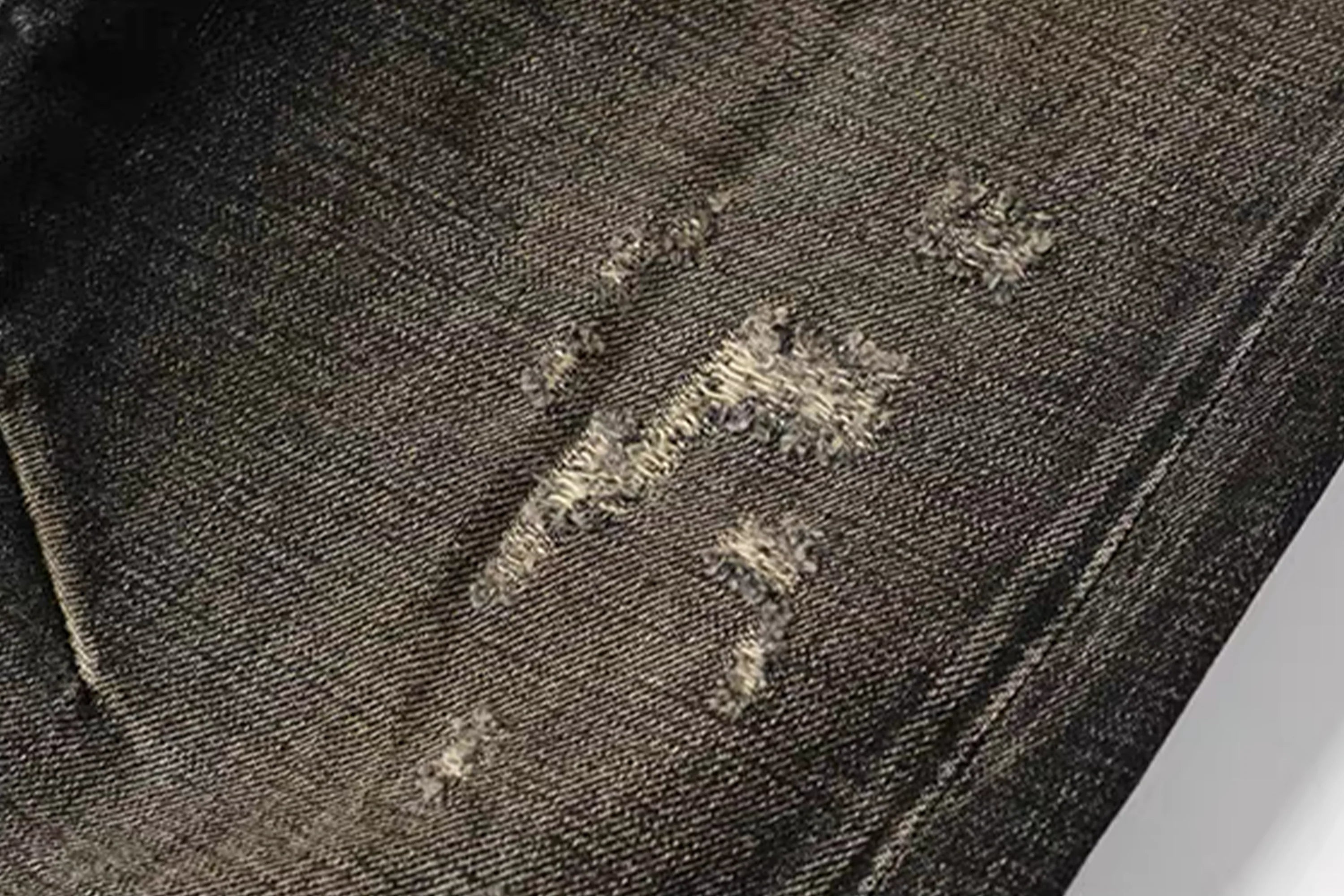 NOTHINGNESS WORLD Distressed Ripple-Wash Graphic Denim Pants