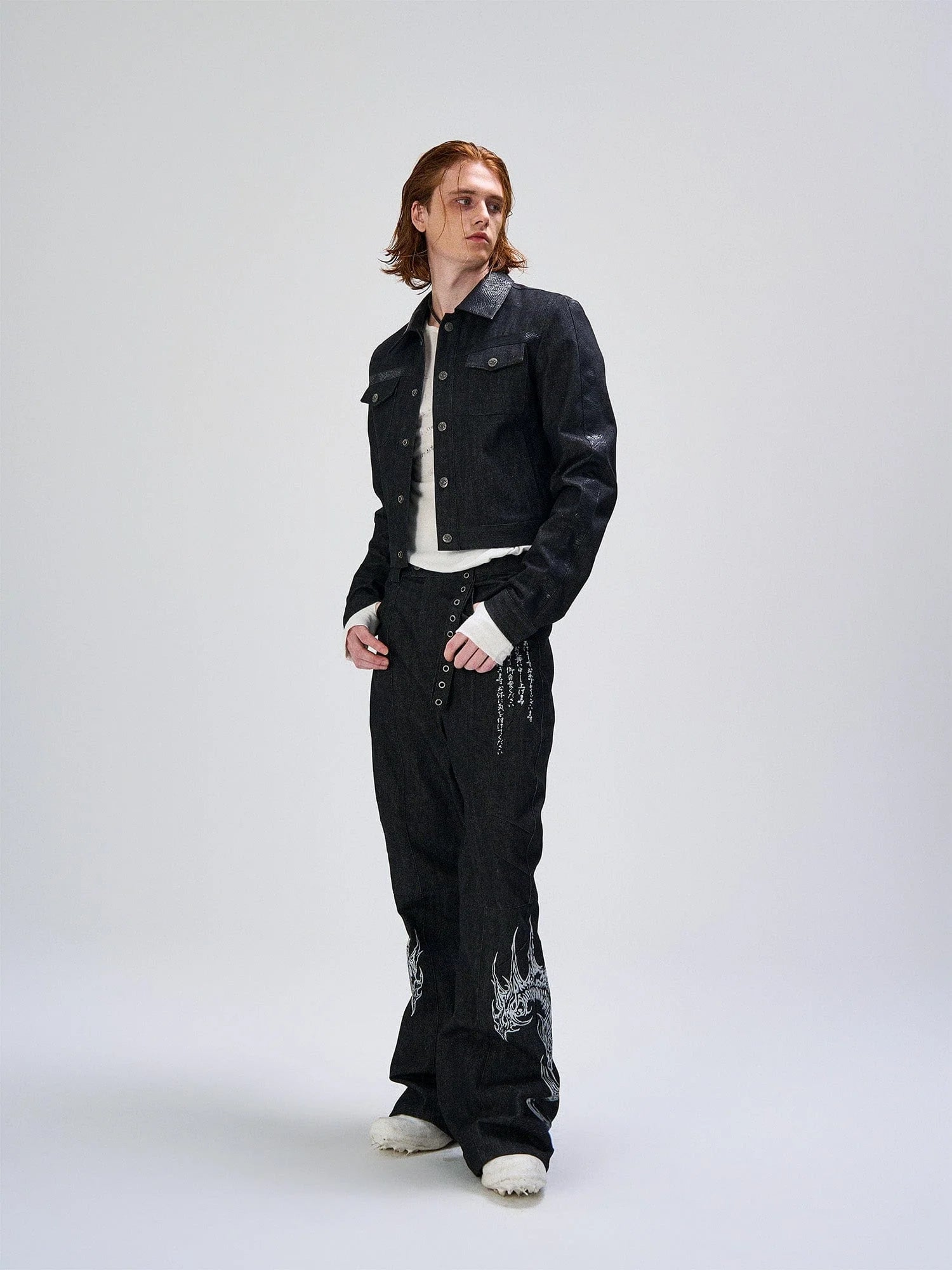FLYERRER Abstract Graphic Flared Raw Jeans