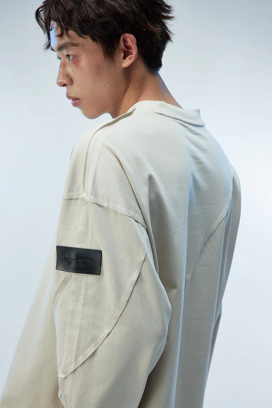 WHISTLEHUNTER Asymmetric Cut Logo Patched L/S Tee