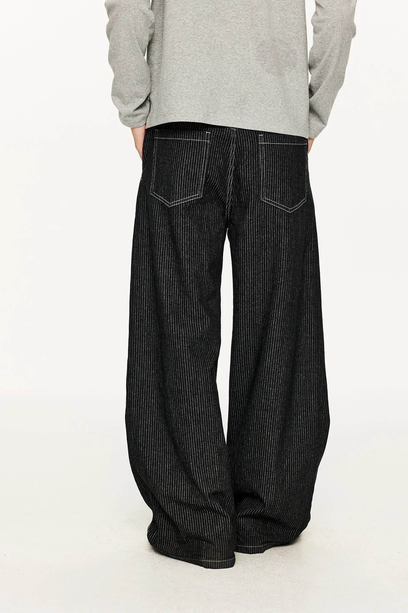 KREATE Asymmetric Button-Up Pleated Jeans