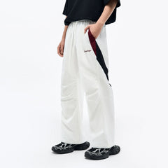 OVERLAPS Contrast Panel Crinkled-Knee Track Pants