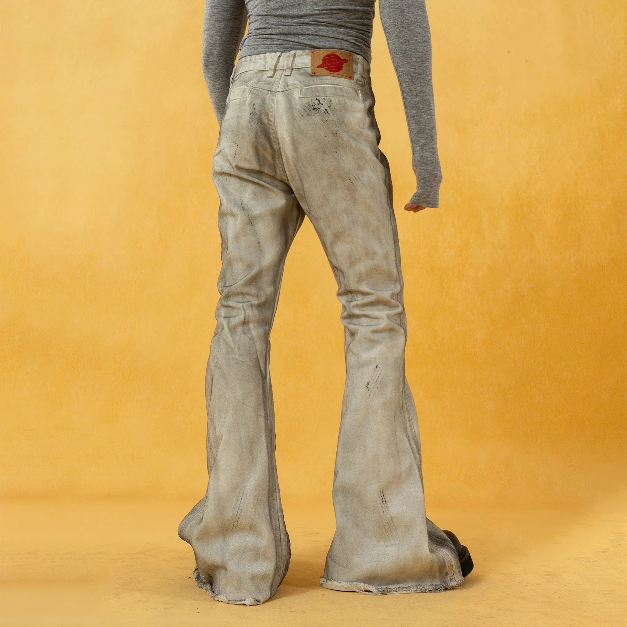 CLP Spliced Distressed Raw Edge Flared Jeans