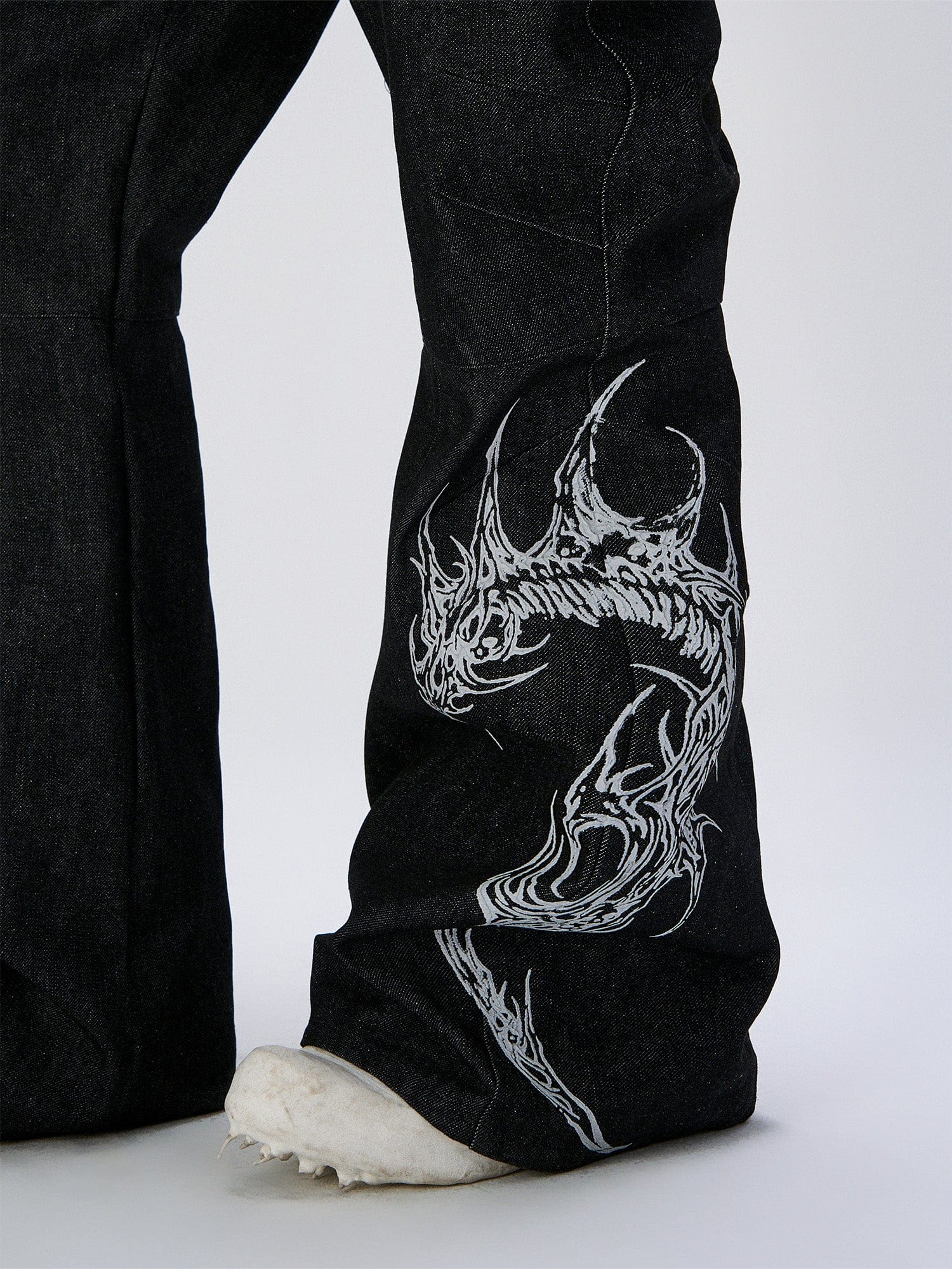 FLYERRER Abstract Graphic Flared Raw Jeans
