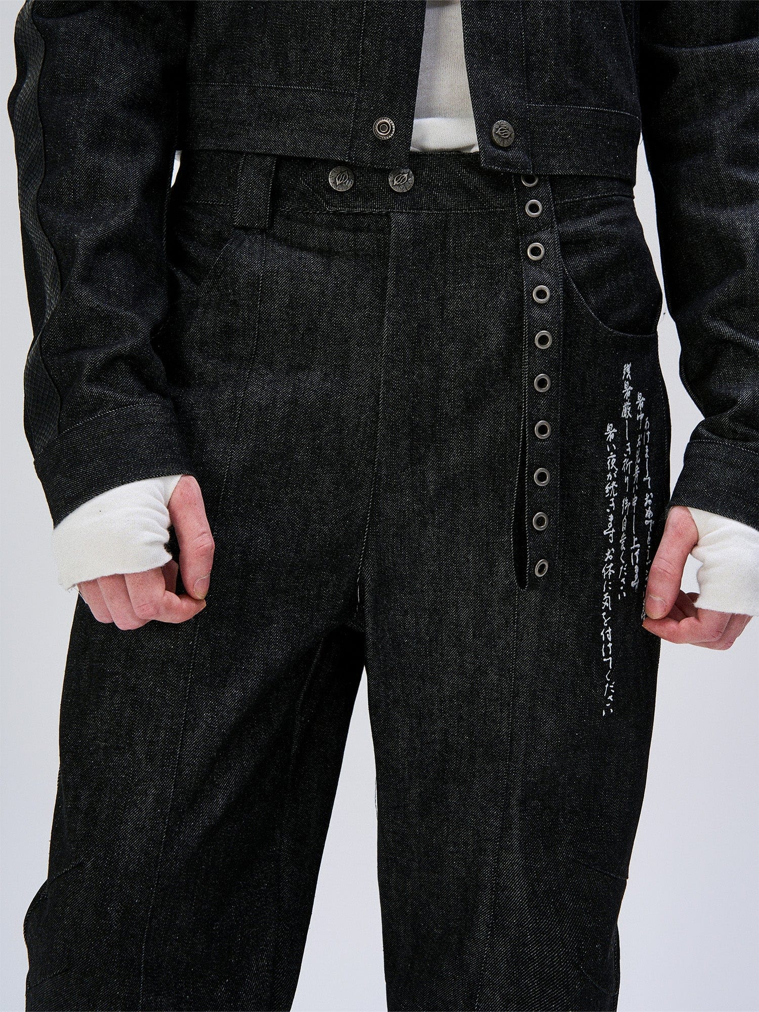 FLYERRER Abstract Graphic Flared Raw Jeans