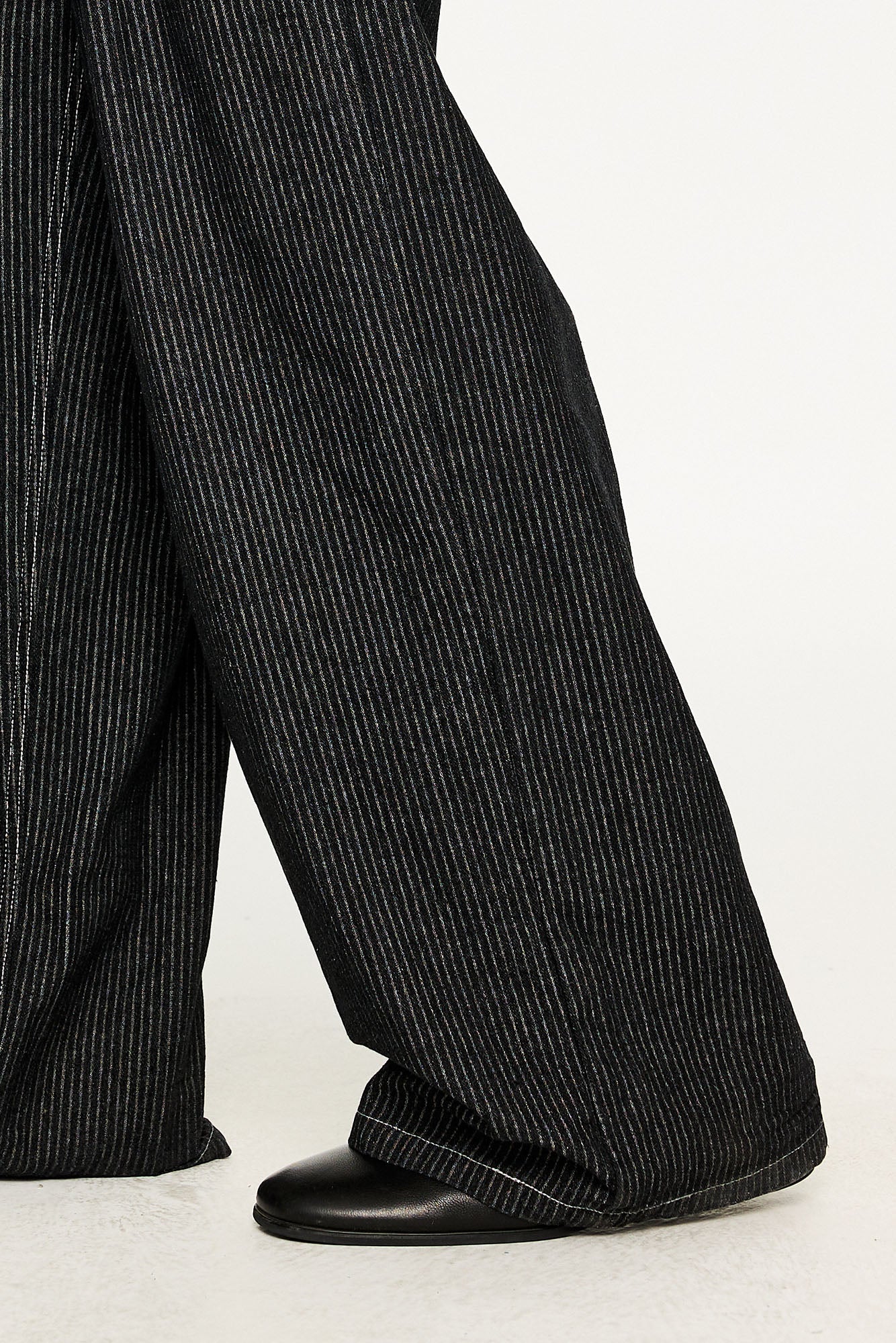 KREATE Asymmetric Button-Up Pleated Jeans