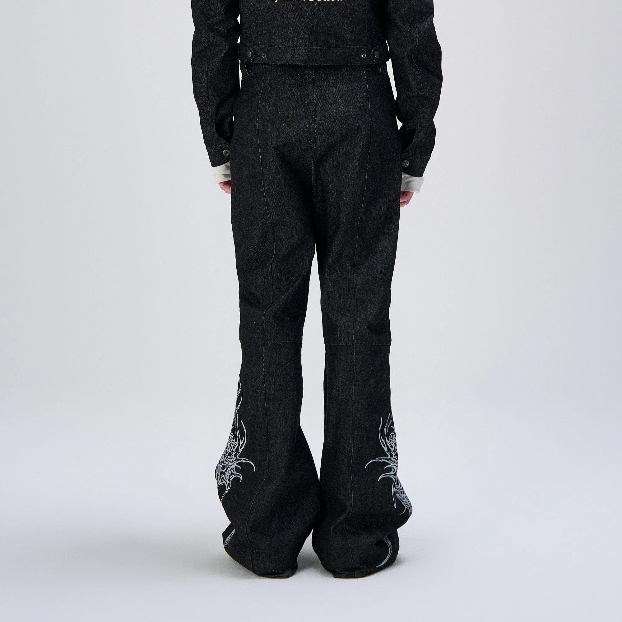 FLYERRER Abstract Graphic Flared Raw Jeans