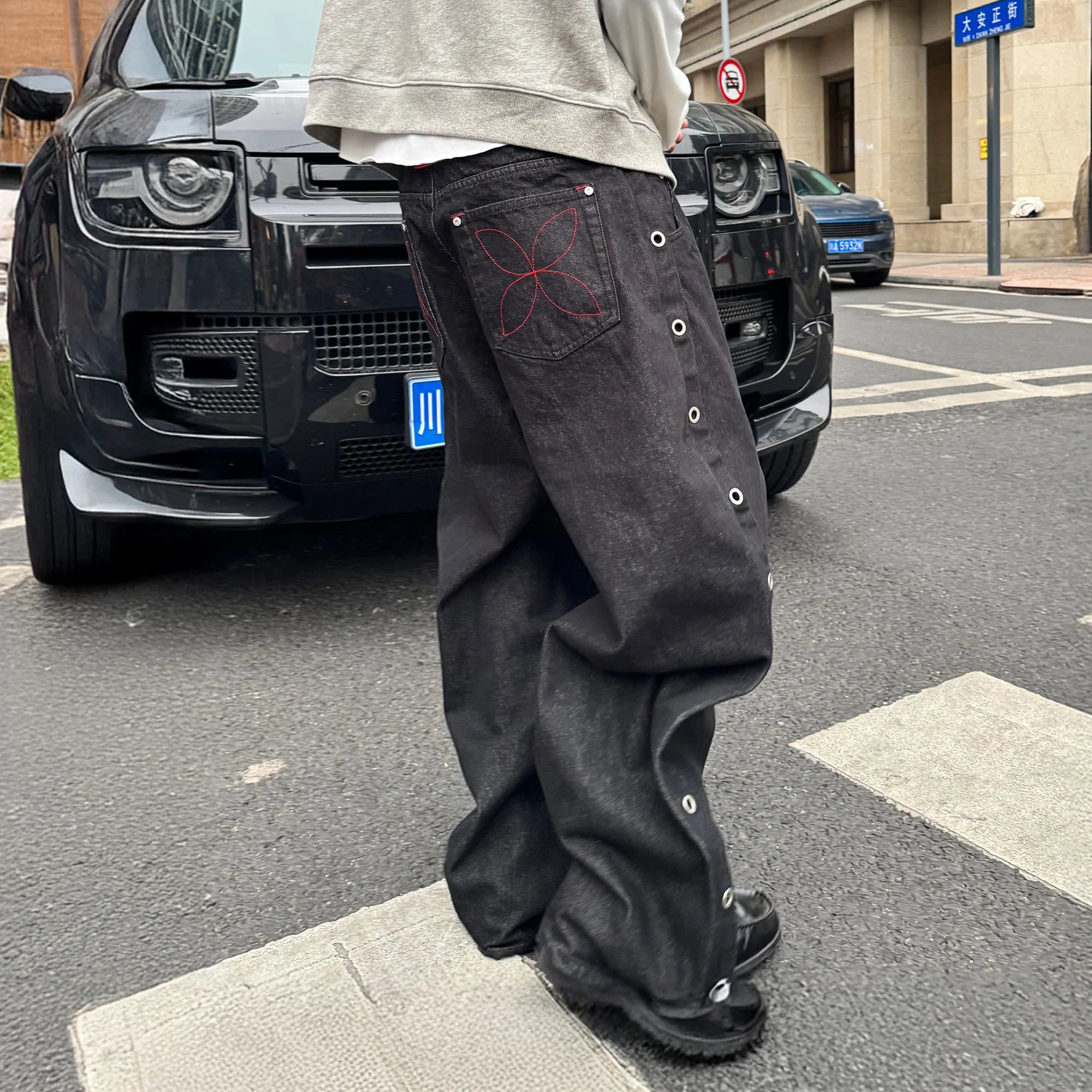 STEEPC Grommet Snap-Fly Flared Raw Jeans