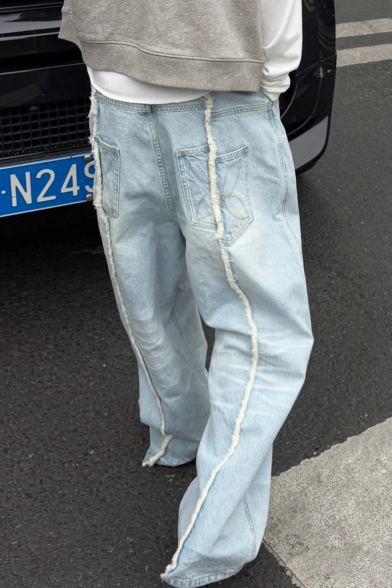 STEEPC Washed Frayed Seam Baggy Jeans