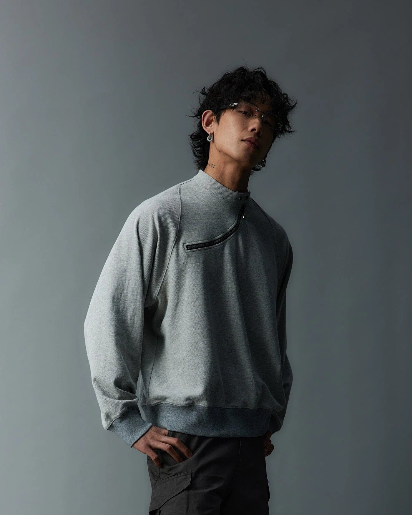 WHISTLEHUNTER Asymmetrical Zipper Rivet Mock Neck Light Sweatshirt