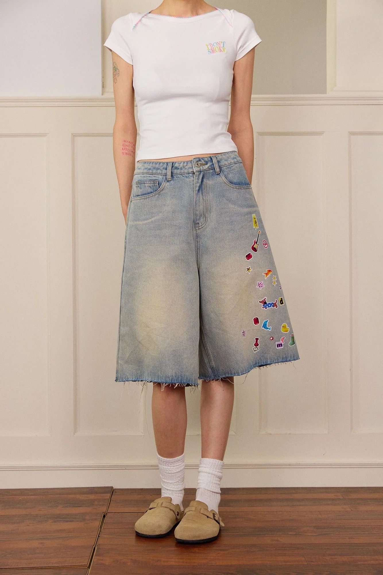 DONSMOKE Whimsical Stickers Washed Raw-Edge Shorts