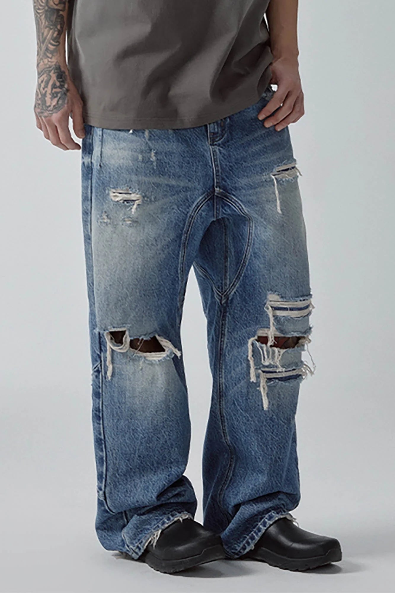 F2CE Ripped Curved Spliced Jeans