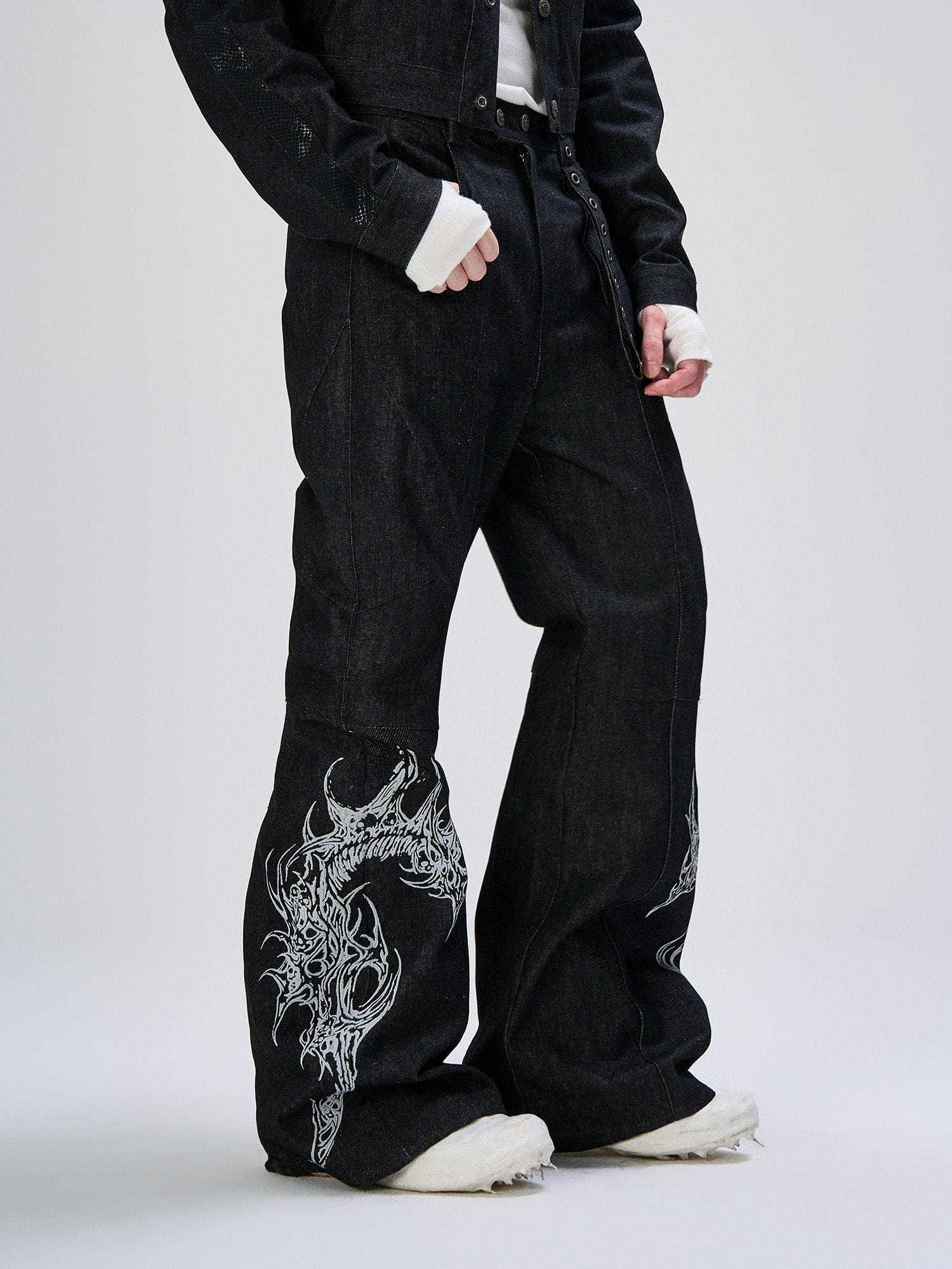 FLYERRER Abstract Graphic Flared Raw Jeans