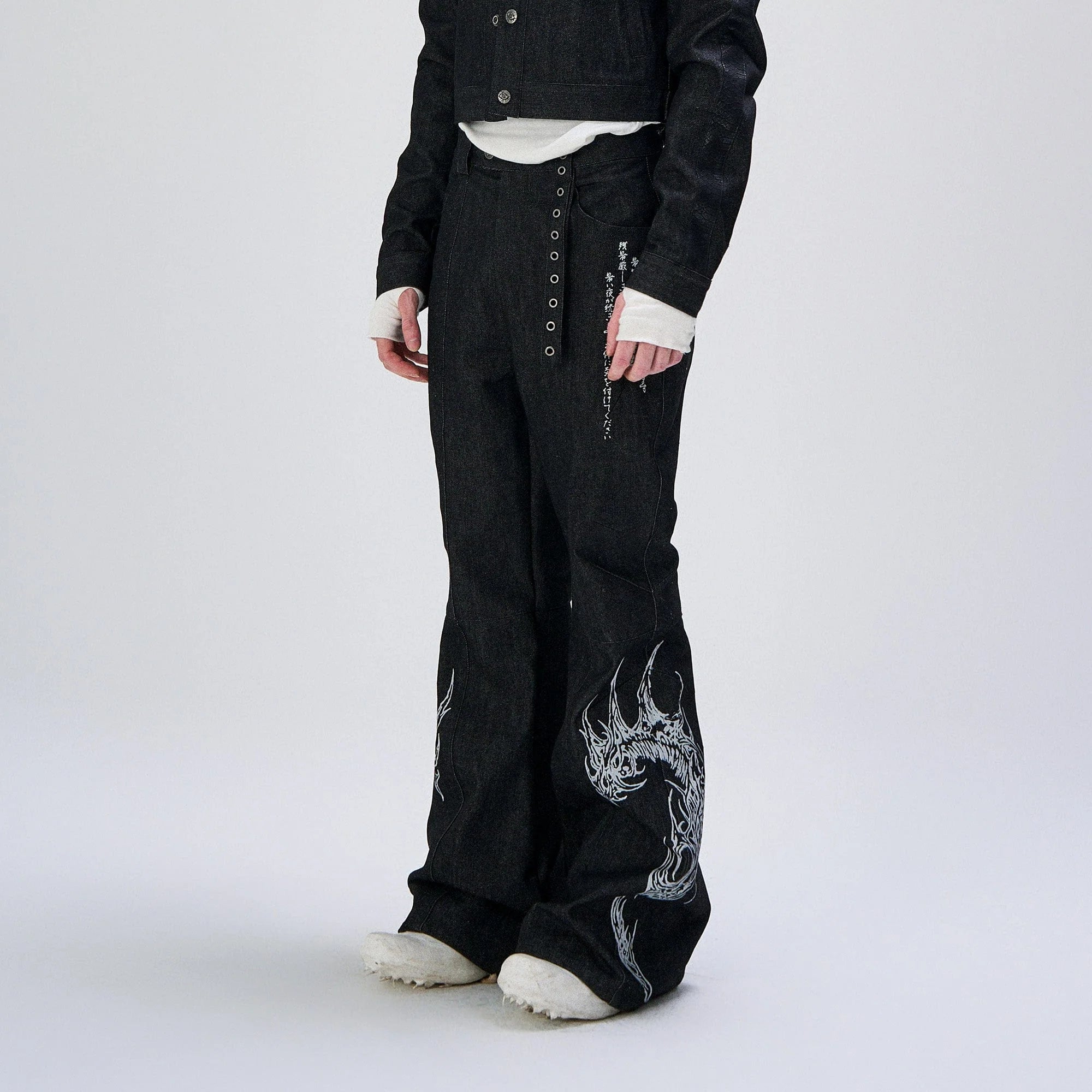 FLYERRER Abstract Graphic Flared Raw Jeans
