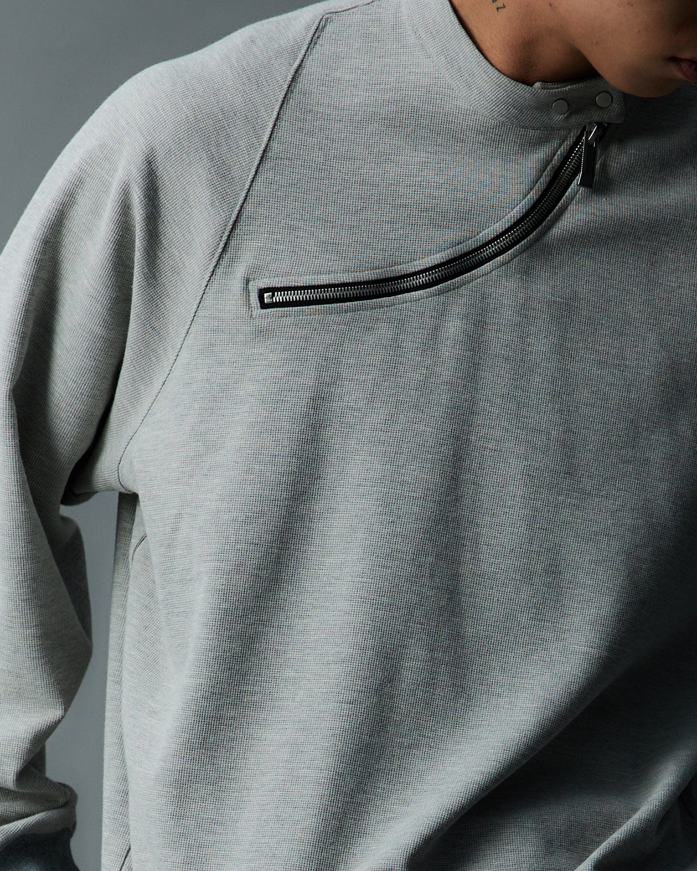 WHISTLEHUNTER Asymmetrical Zipper Rivet Mock Neck Light Sweatshirt