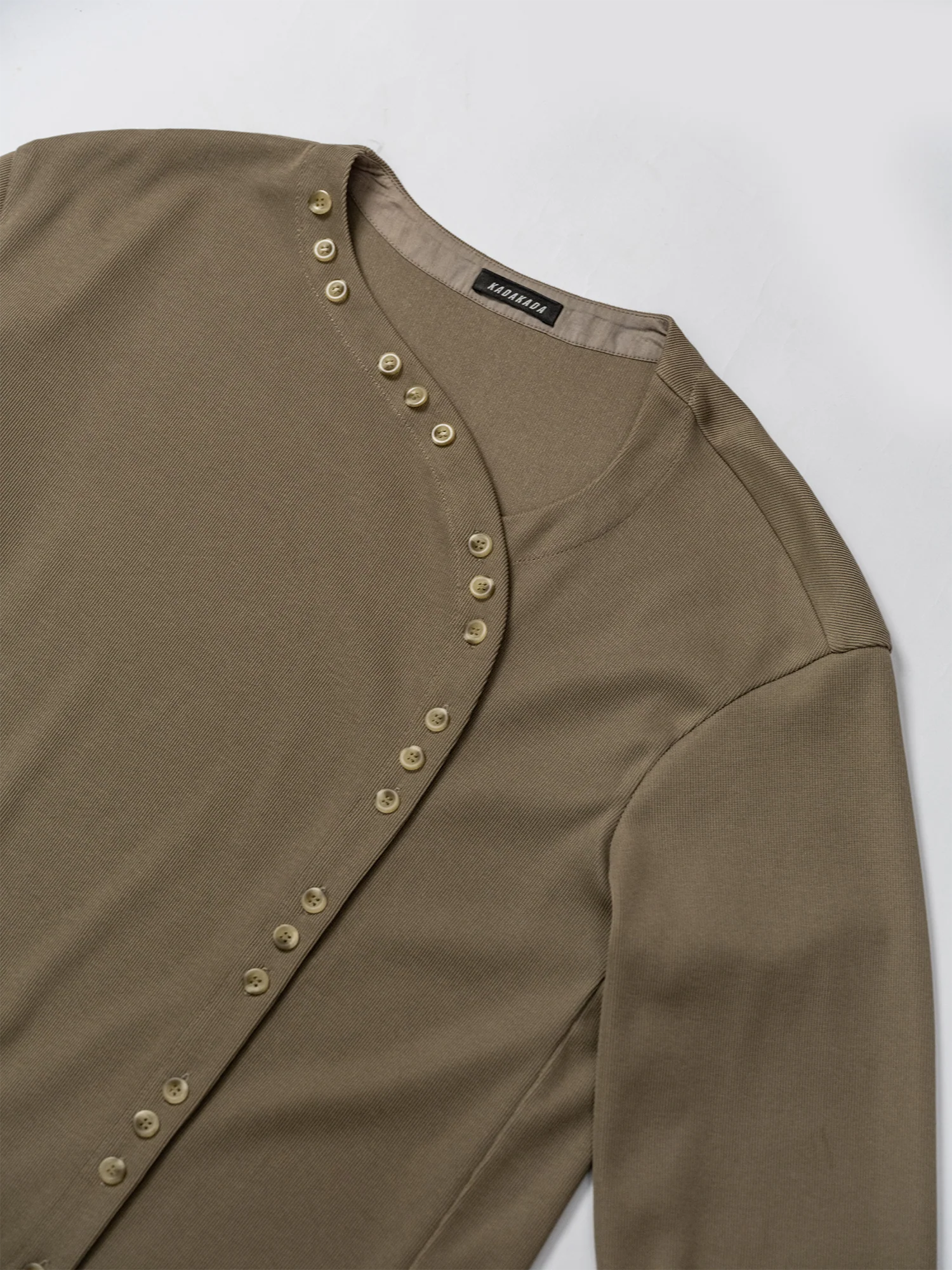 KADAKADA Buttoned Curved Placket Ribbed Knit Top