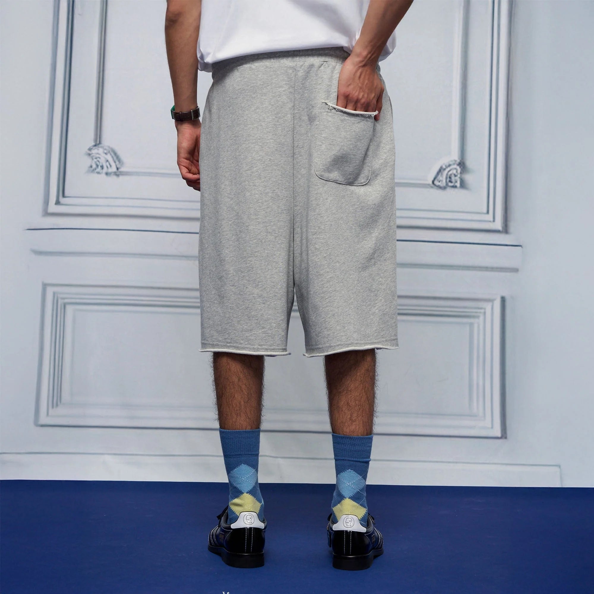UNLIMITED MOTE Multi-Pleated Drawstring Raw-Hem Shorts