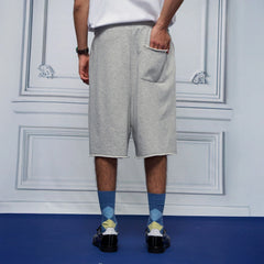 UNLIMITED MOTE Multi-Pleated Drawstring Raw-Hem Shorts