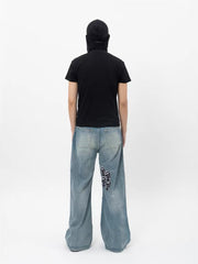 NOTHINGNESS WORLD Washed Tongue Embroidered Denim Pants