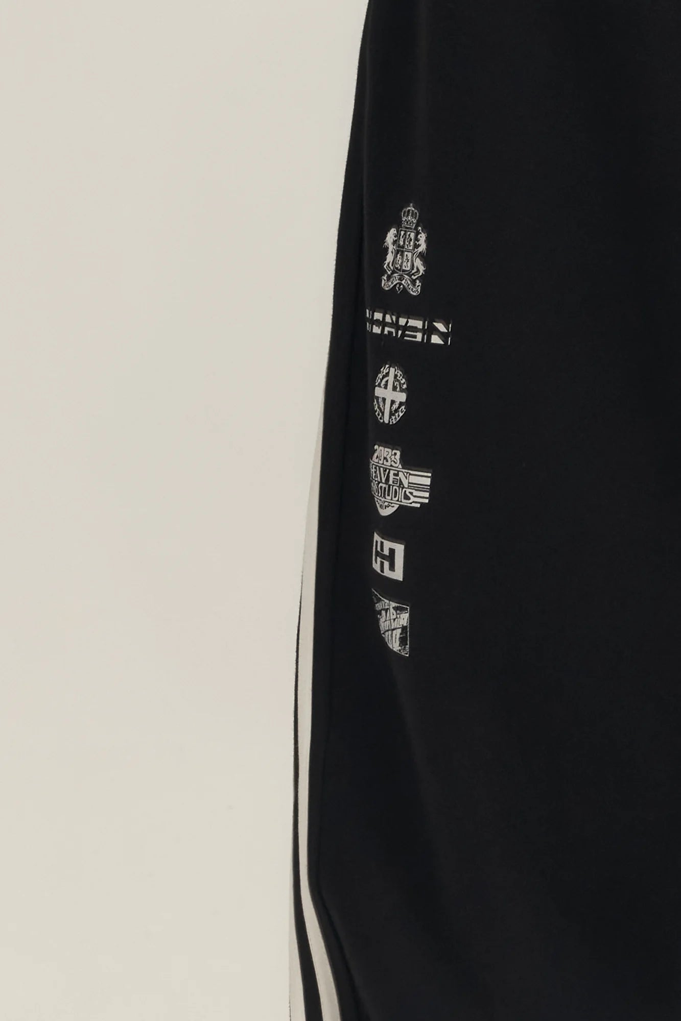 SAVAGEGROWTHWORLD Back-Arc Striped Graphic Track Pants