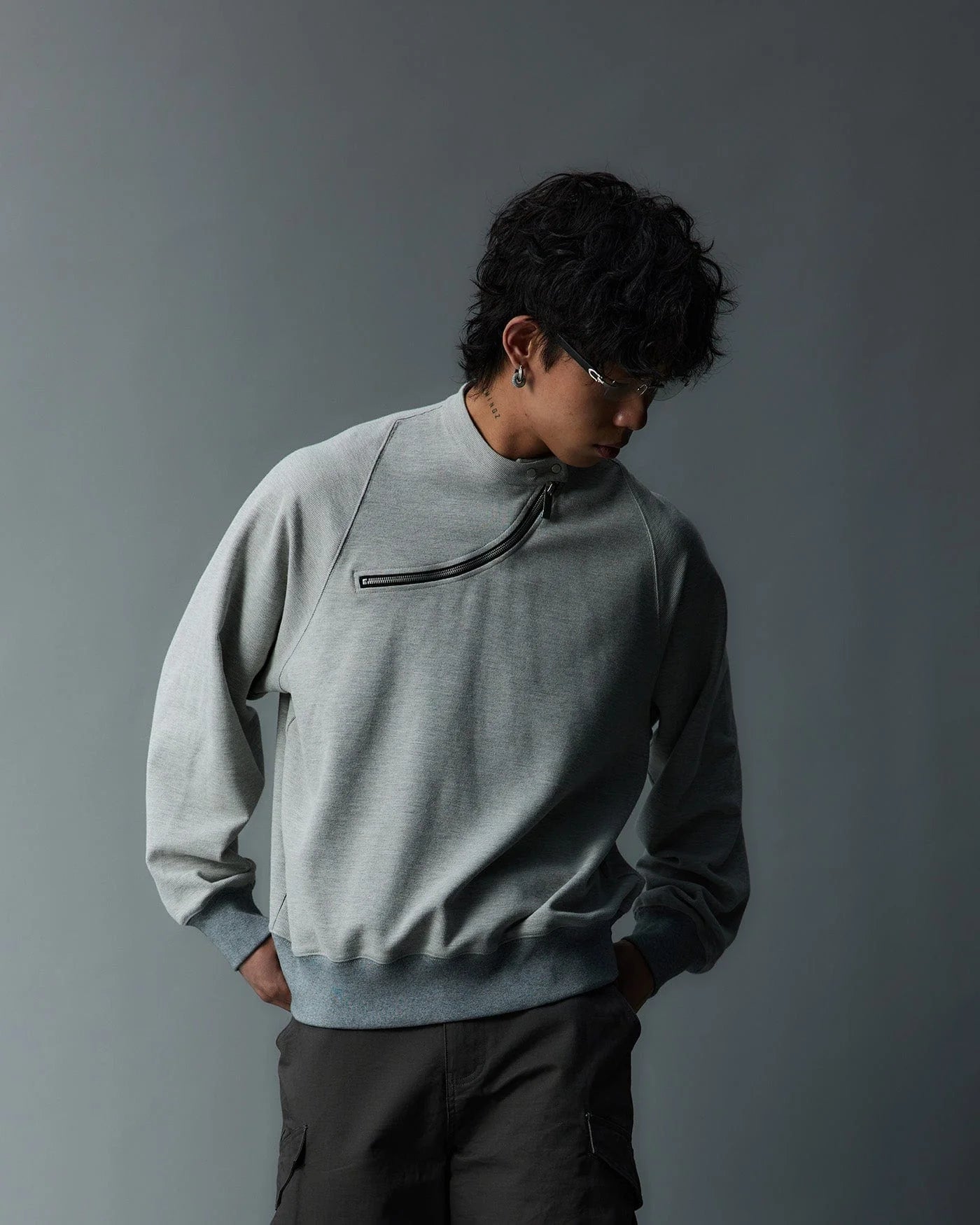 WHISTLEHUNTER Asymmetrical Zipper Rivet Mock Neck Light Sweatshirt