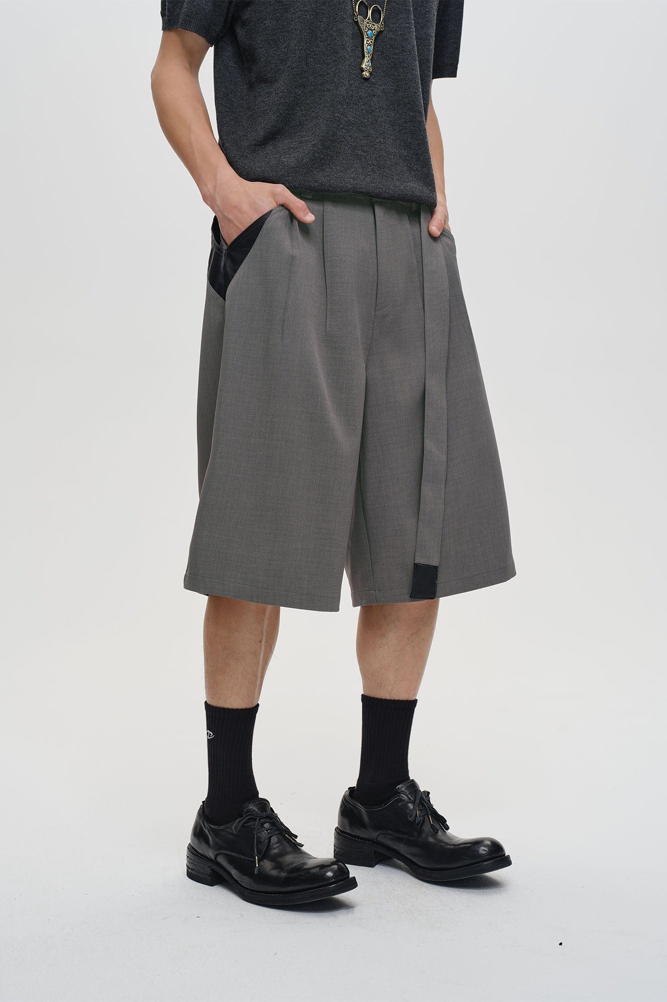CATSSTAC Pleated Belted Wide-Leg Shorts