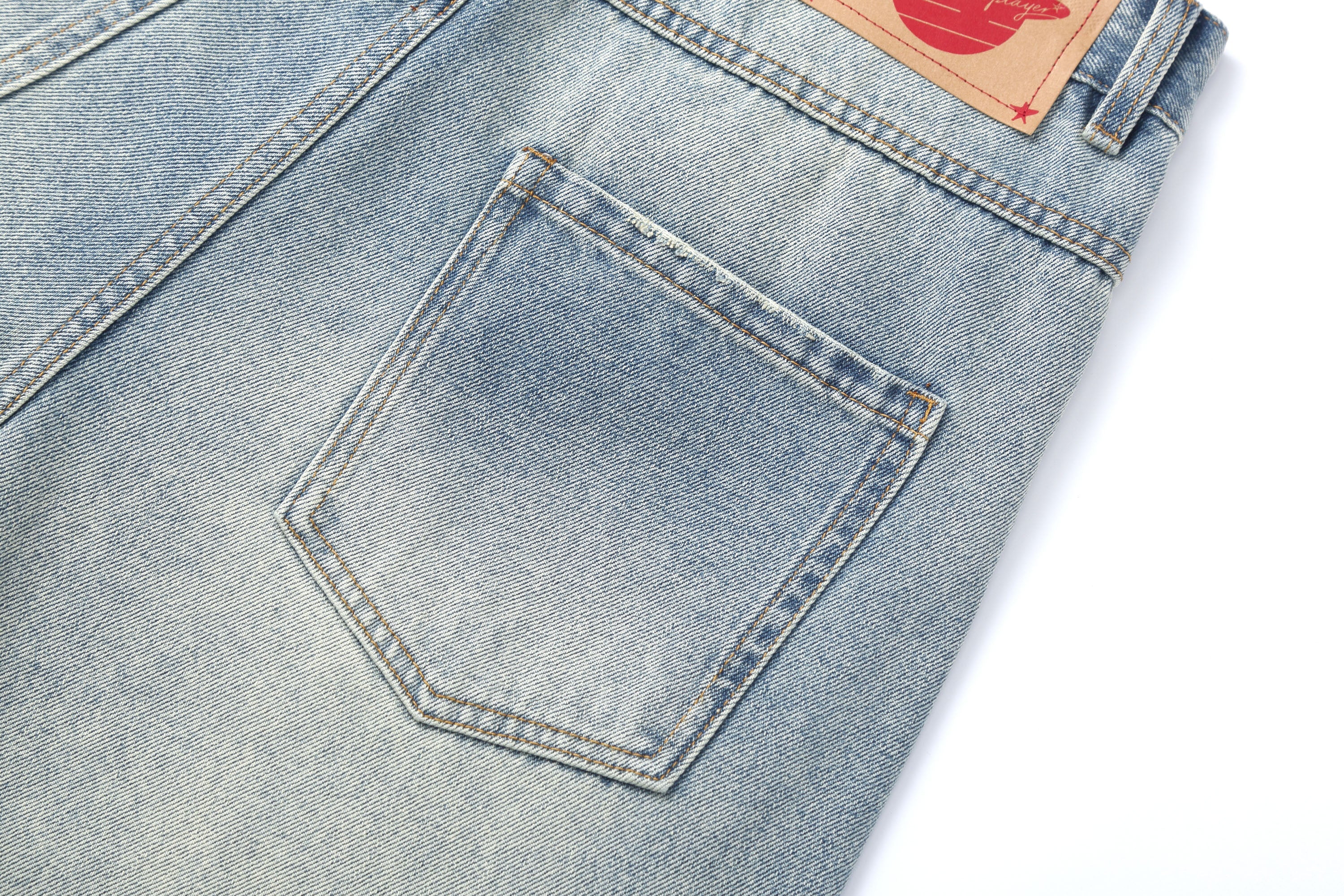 CLP Whiskering Washed Oversized Curved-Leg Jeans