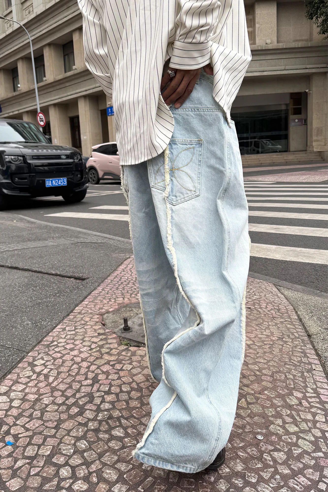 STEEPC Washed Frayed Seam Baggy Jeans