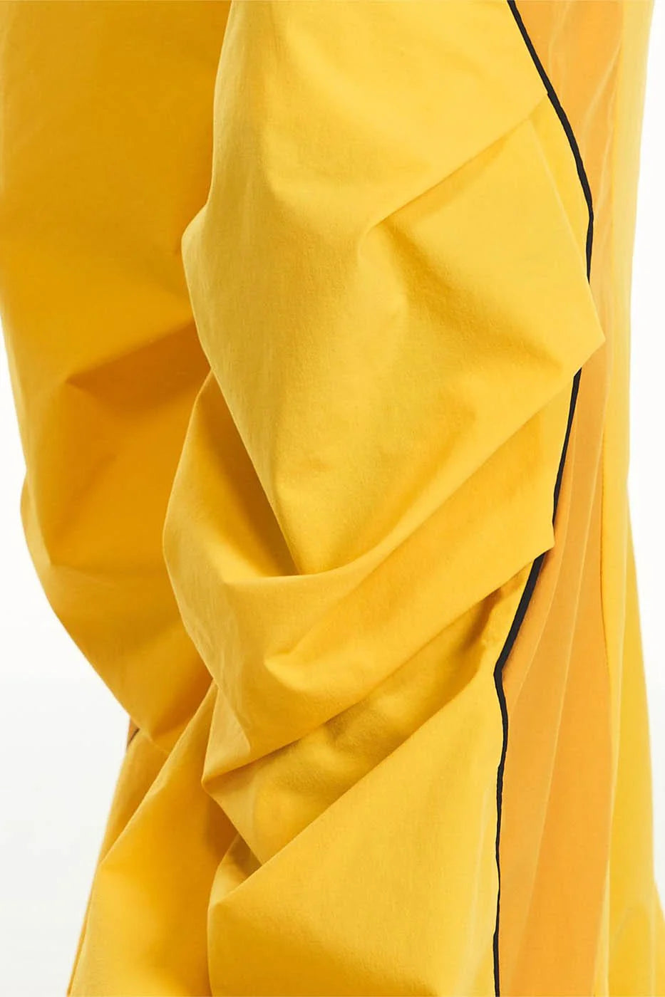 RELABEL Zig-Zag Spliced Pleated Parachute Pants